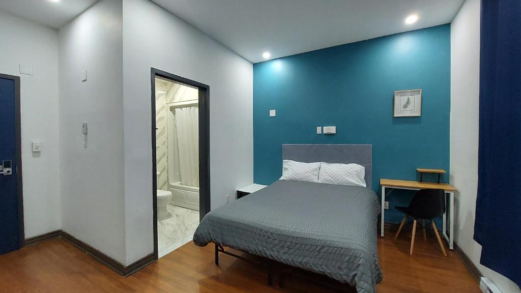 Postel nebo postele na pokoji v ubytování APD HOTEL