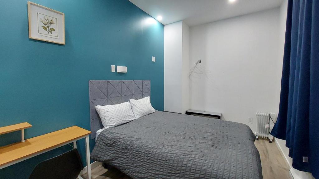 Postel nebo postele na pokoji v ubytování APD HOTEL