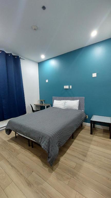 Postel nebo postele na pokoji v ubytování APD HOTEL