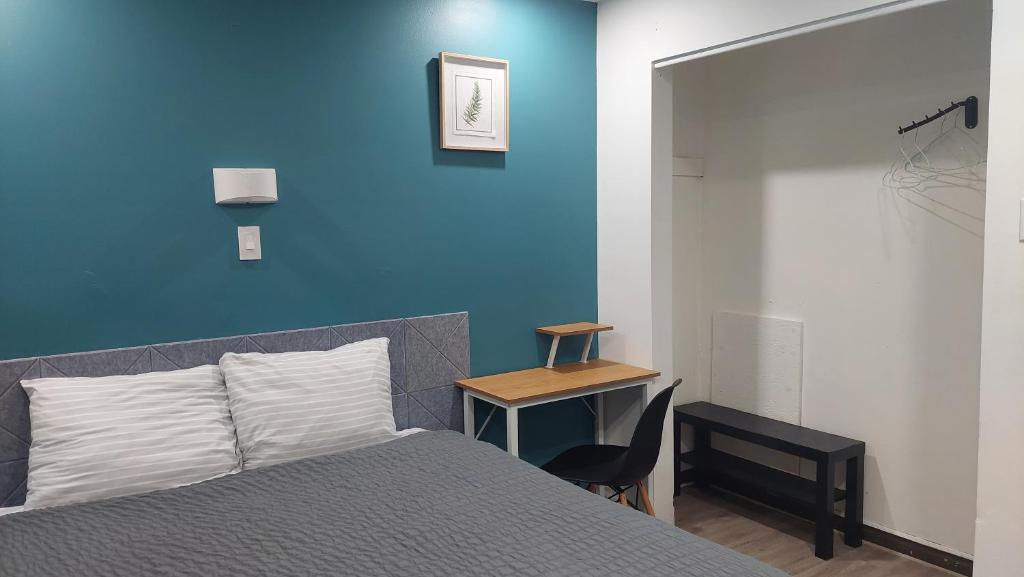 Postel nebo postele na pokoji v ubytování APD HOTEL