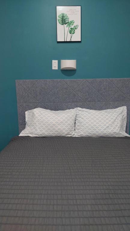 Postel nebo postele na pokoji v ubytování APD HOTEL