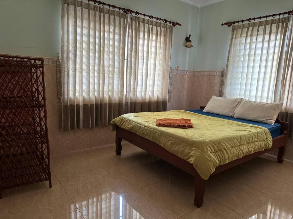 Postel nebo postele na pokoji v ubytování Eco-Home Siem Reap Homestay