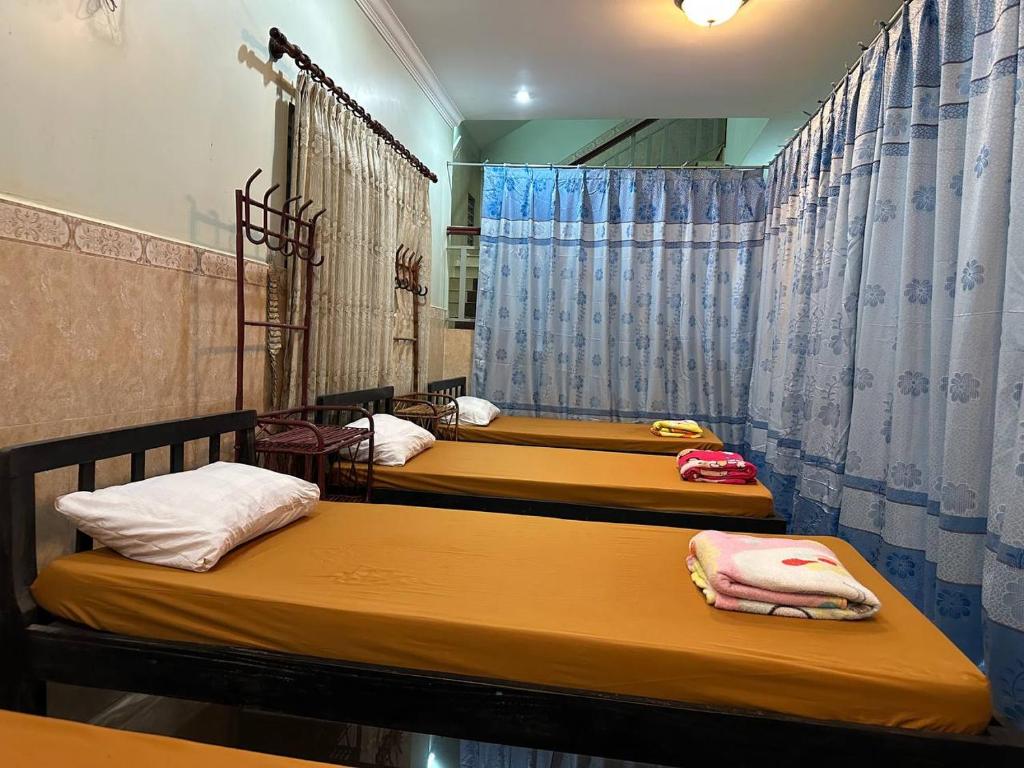 Postel nebo postele na pokoji v ubytování Eco-Home Siem Reap Homestay