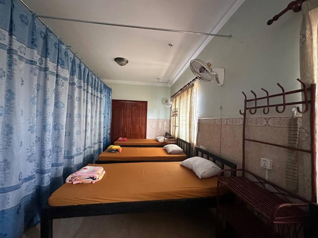 Postel nebo postele na pokoji v ubytování Eco-Home Siem Reap Homestay
