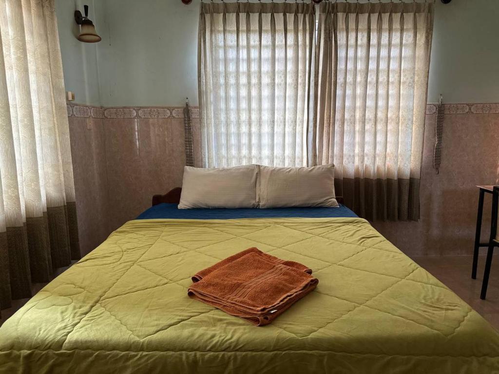 Postel nebo postele na pokoji v ubytování Eco-Home Siem Reap Homestay