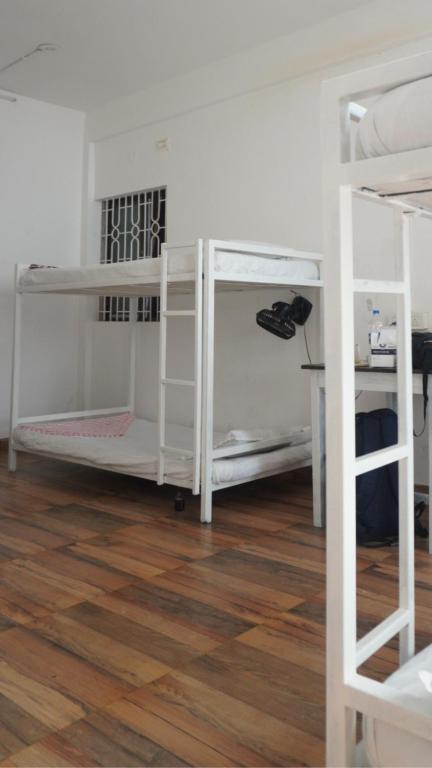 Cama o camas de una habitación en This is it Beachfront - Rooms, Cafe & Events