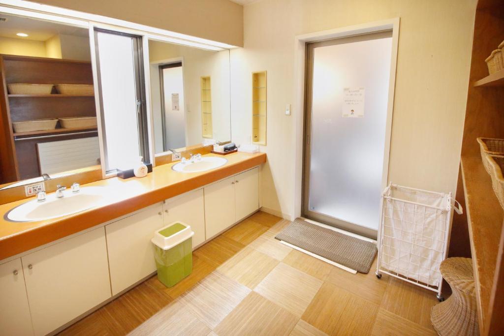 Koupelna v ubytování Hakone Kohaku Onsen Hotel 箱根琥珀温泉ホテル