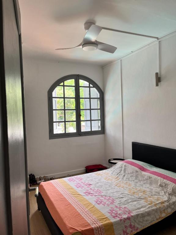 Postel nebo postele na pokoji v ubytování Villa Tropic Adel