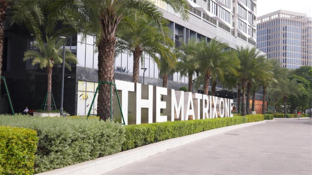 a large sign that reads the markup in front of a building at The Matrix One - Luxury free Gym&Pool in Hanoi