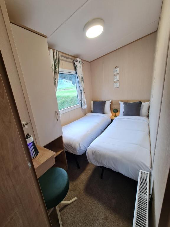 Postel nebo postele na pokoji v ubytování 5 lochview
