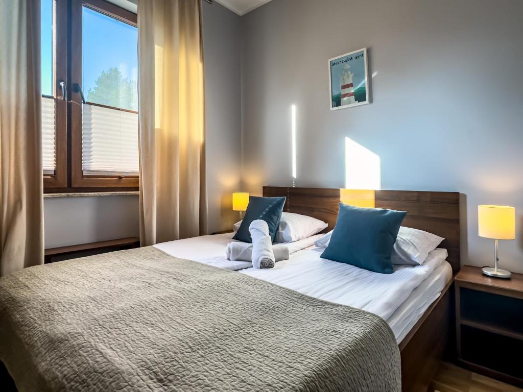 Postel nebo postele na pokoji v ubytování Villa 4 Pory Roku