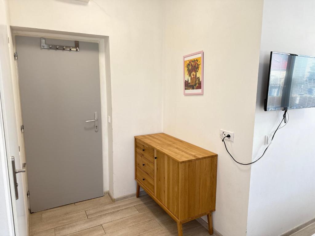 TV a/nebo společenská místnost v ubytování Apartmány LETO