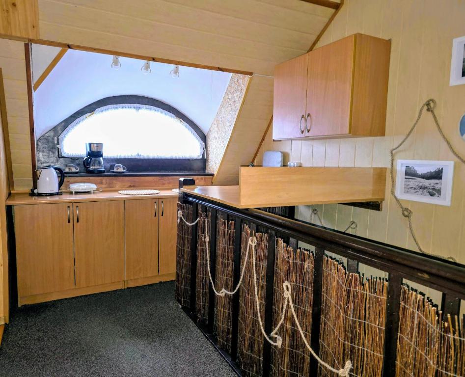 Kuchyň nebo kuchyňský kout v ubytování PROMYK - Apartamenty & Pokoje - dla dorosłych