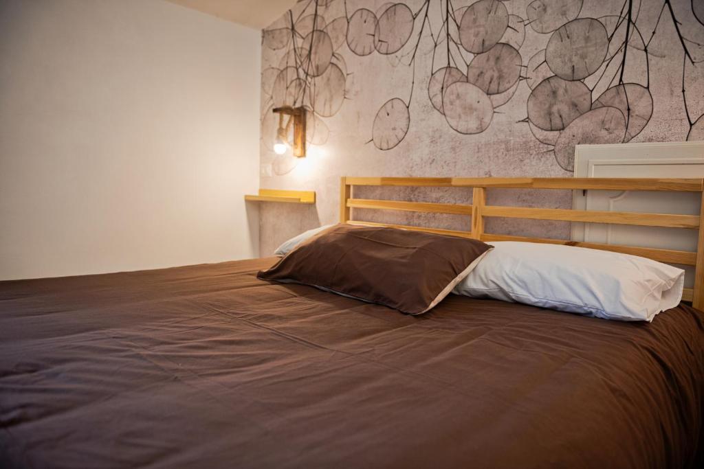 Postel nebo postele na pokoji v ubytování B&B Il Fiore nel Bosco