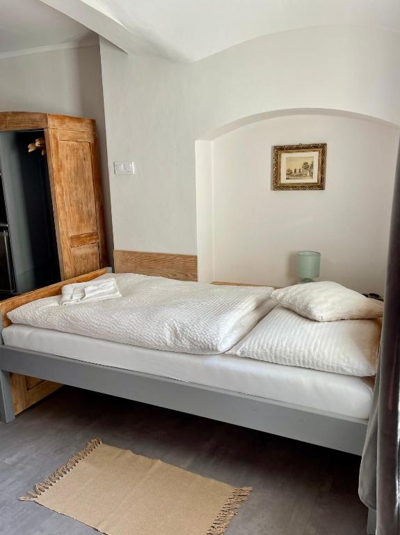 Postel nebo postele na pokoji v ubytování Bed & breakfast Hugo