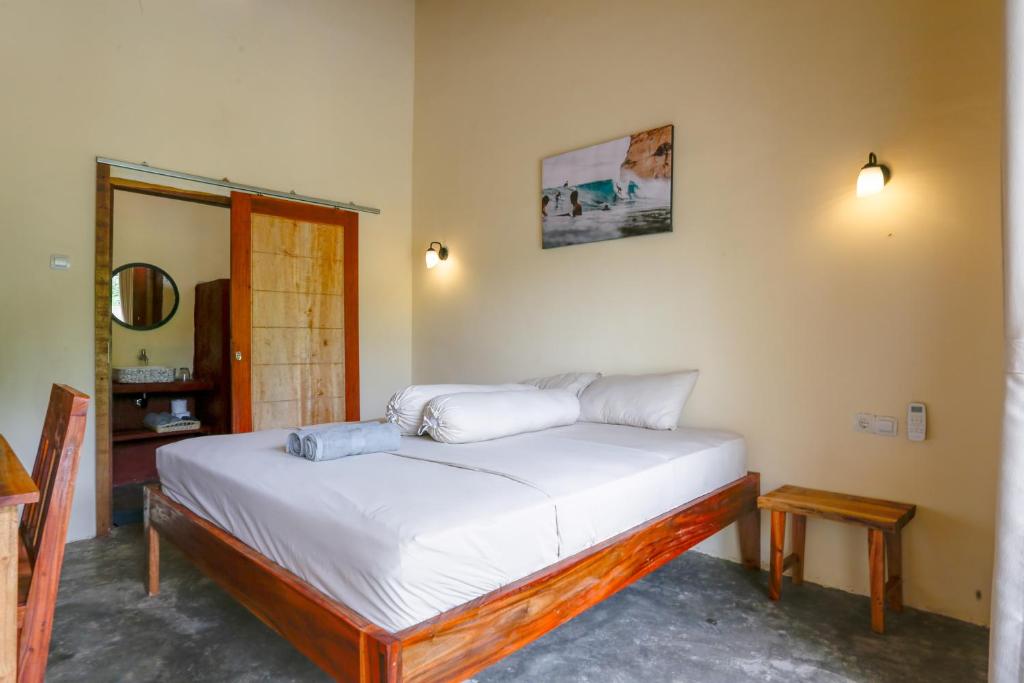 Postel nebo postele na pokoji v ubytování Oceanside House