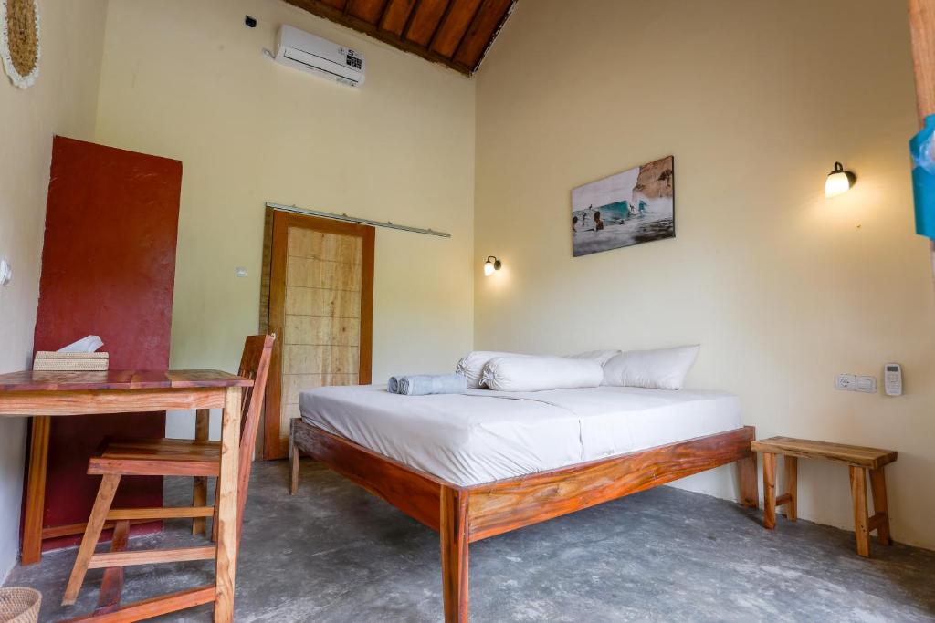 Postel nebo postele na pokoji v ubytování Oceanside House
