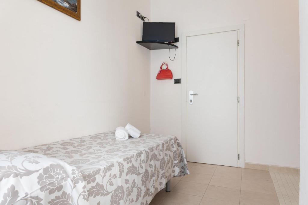 Postel nebo postele na pokoji v ubytování Nautilus Hotel Family