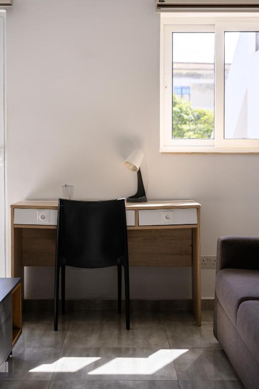 Posezení v ubytování F9 Room 2, Private Room two single beds shared bathroom in shared Flat