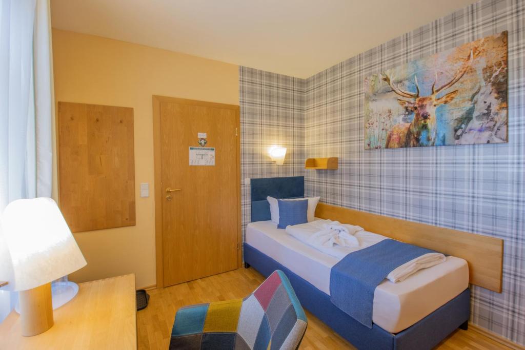 Postel nebo postele na pokoji v ubytování Ferien Residenz Thüringer Wald