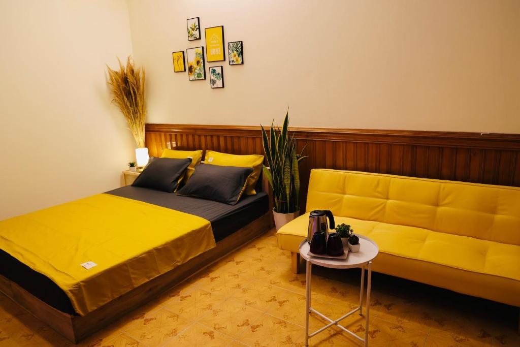 Postel nebo postele na pokoji v ubytování Homestay Lăng Bác