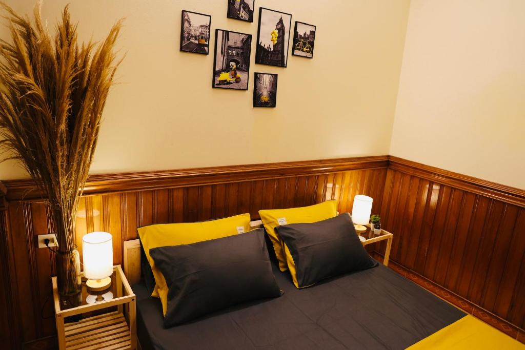 Postel nebo postele na pokoji v ubytování Homestay Lăng Bác
