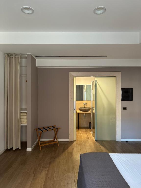Postel nebo postele na pokoji v ubytování Olivia Rooms Teocrito