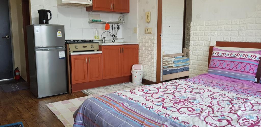 Kuchyň nebo kuchyňský kout v ubytování Jun House
