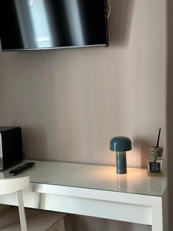 TV a/nebo společenská místnost v ubytování Olivia Rooms Teocrito