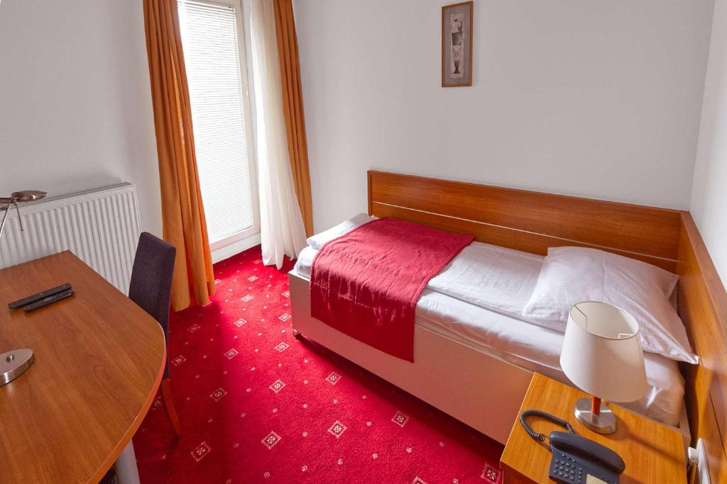 Postel nebo postele na pokoji v ubytování Hotel Creina