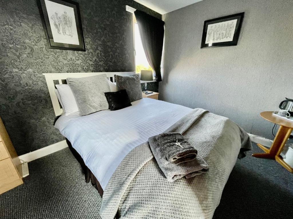 Postel nebo postele na pokoji v ubytování Vaila Guest House