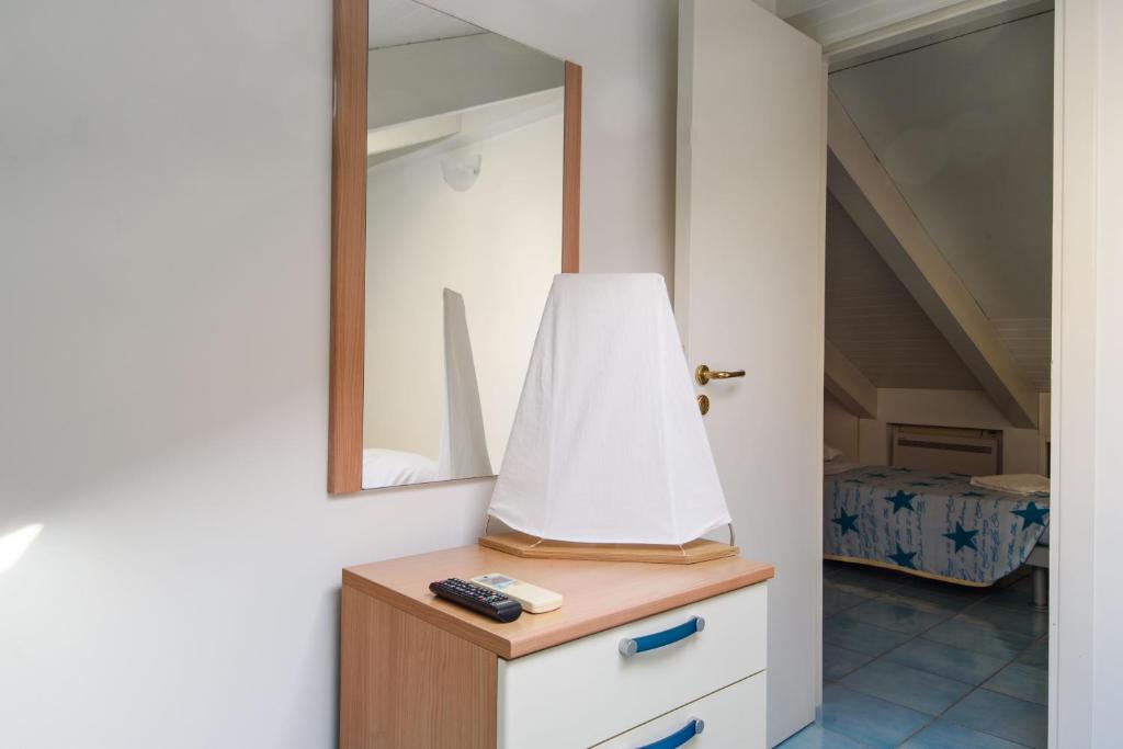 A bed or beds in a room at LUIMAR Holiday House