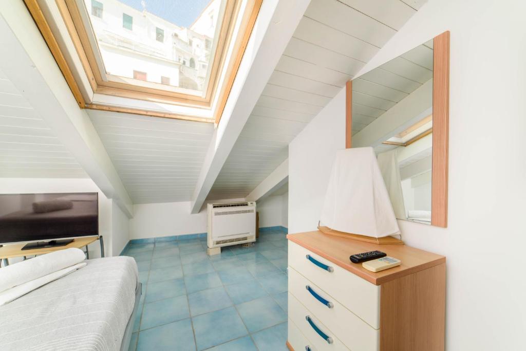 A bed or beds in a room at LUIMAR Holiday House