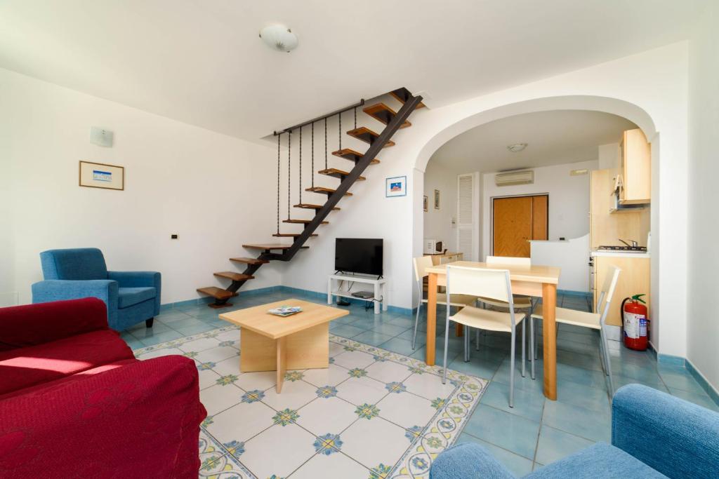 A seating area at LUIMAR Holiday House