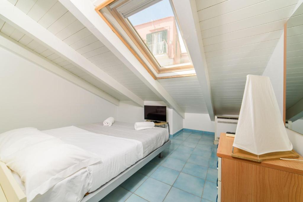 A bed or beds in a room at LUIMAR Holiday House