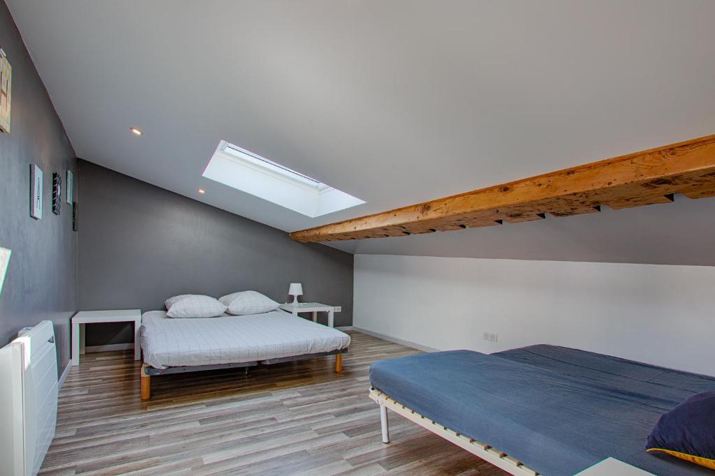 Postel nebo postele na pokoji v ubytování Gîte Ludomi