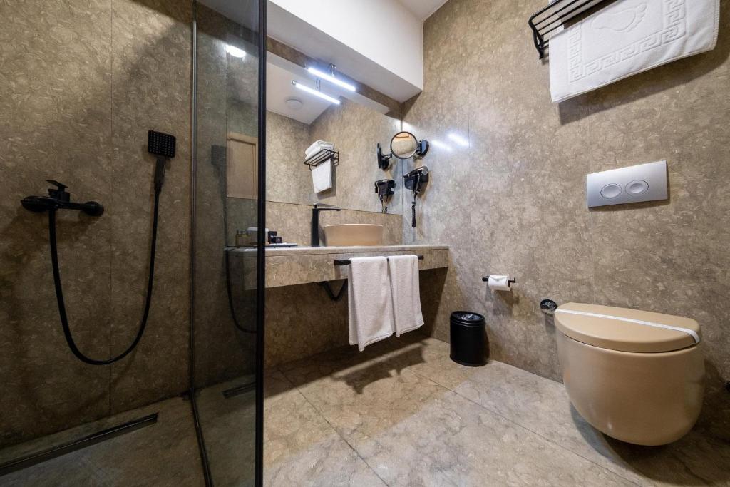 Koupelna v ubytování Avec Hotel