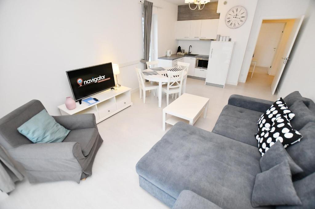 Kuchyňa alebo kuchynka v ubytovaní Apartamenty NAVIGATOR-PORT VIEW