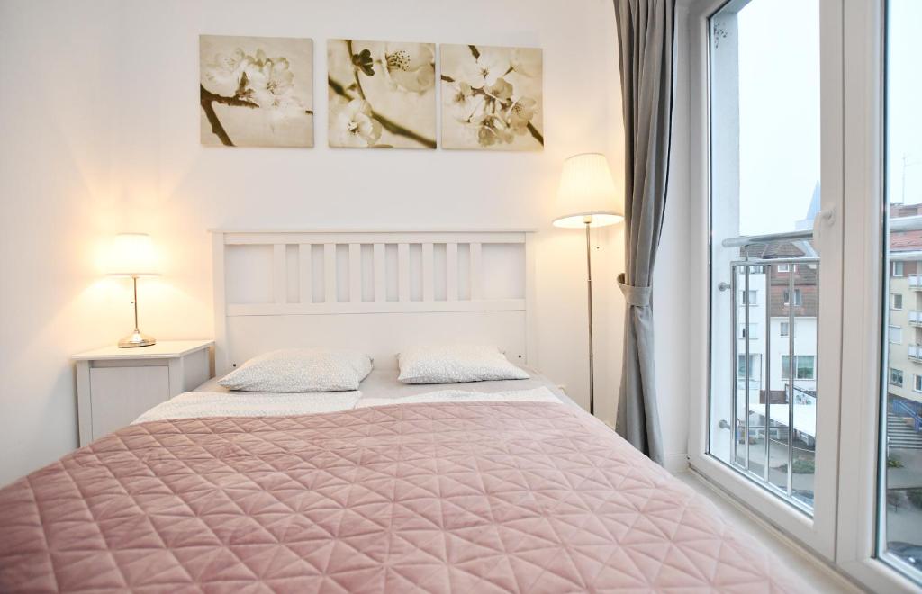 Posteľ alebo postele v izbe v ubytovaní Apartamenty NAVIGATOR-PORT VIEW