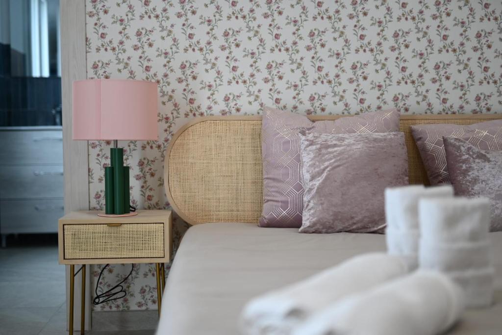 Postel nebo postele na pokoji v ubytování Residenze Miao
