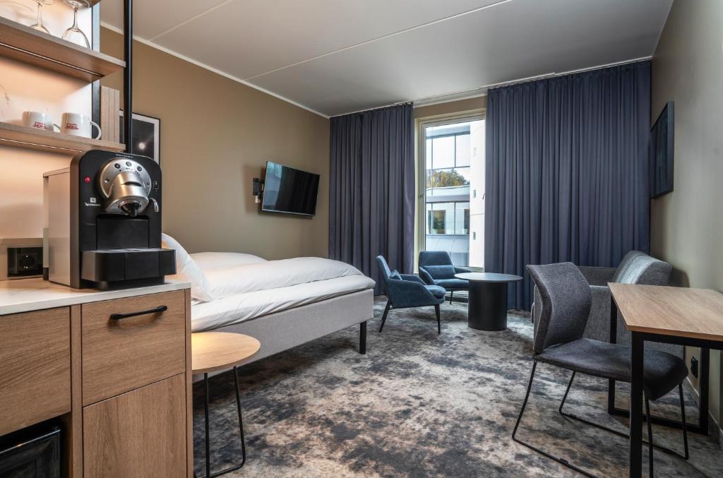 Postel nebo postele na pokoji v ubytování Thon Partner Hotel Ullevaal Stadion