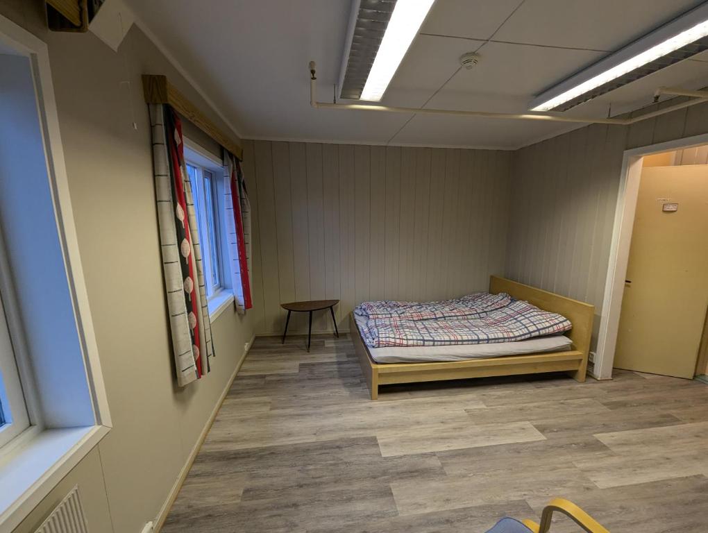 En eller flere senge i et værelse på Givas