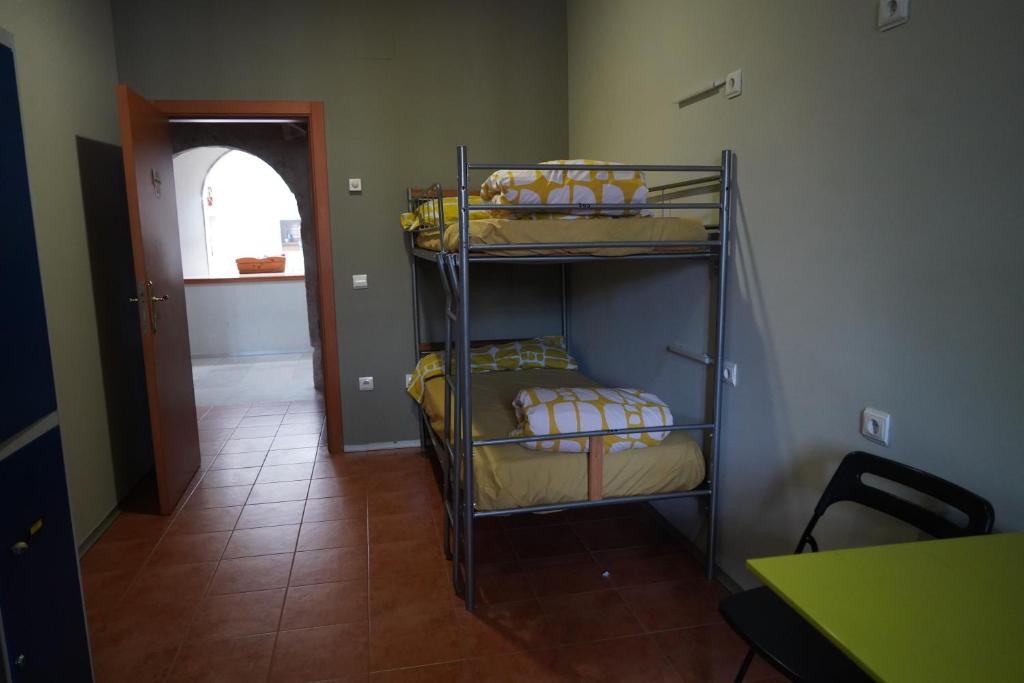 Postel nebo postele na pokoji v ubytování Albergue de Cuéllar