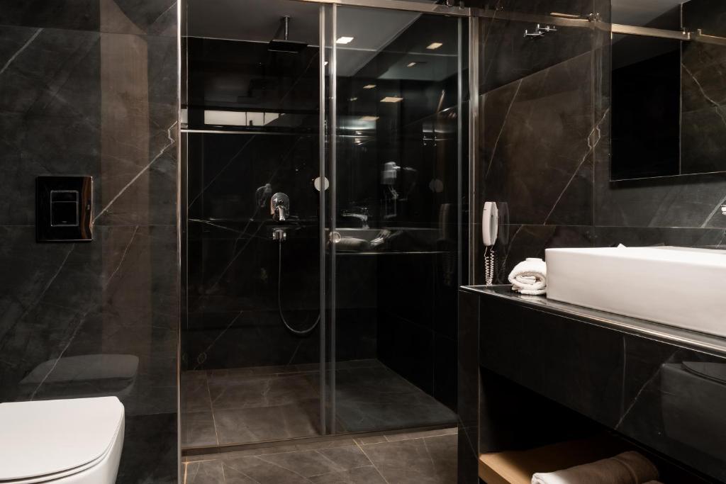 Koupelna v ubytování Palatino Hotel