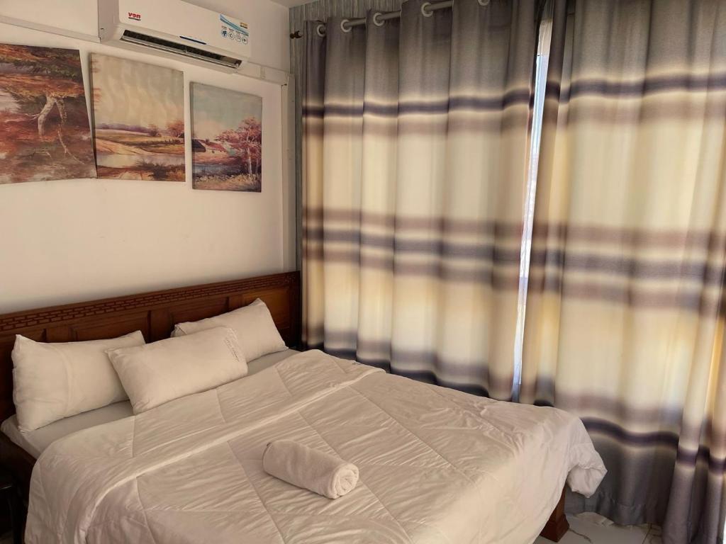 Postel nebo postele na pokoji v ubytování Pinebreeze Holiday Resort