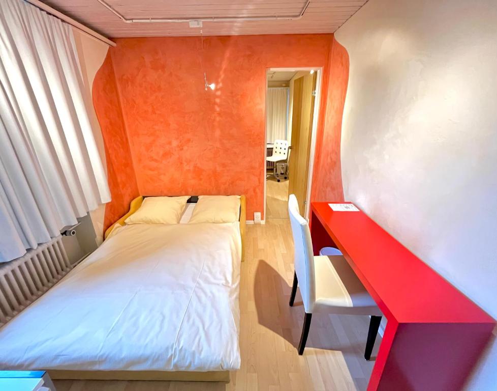 Postel nebo postele na pokoji v ubytování Seiler's Hotel