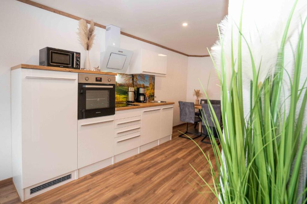 Kuchyň nebo kuchyňský kout v ubytování Ferienhaus Glöckner