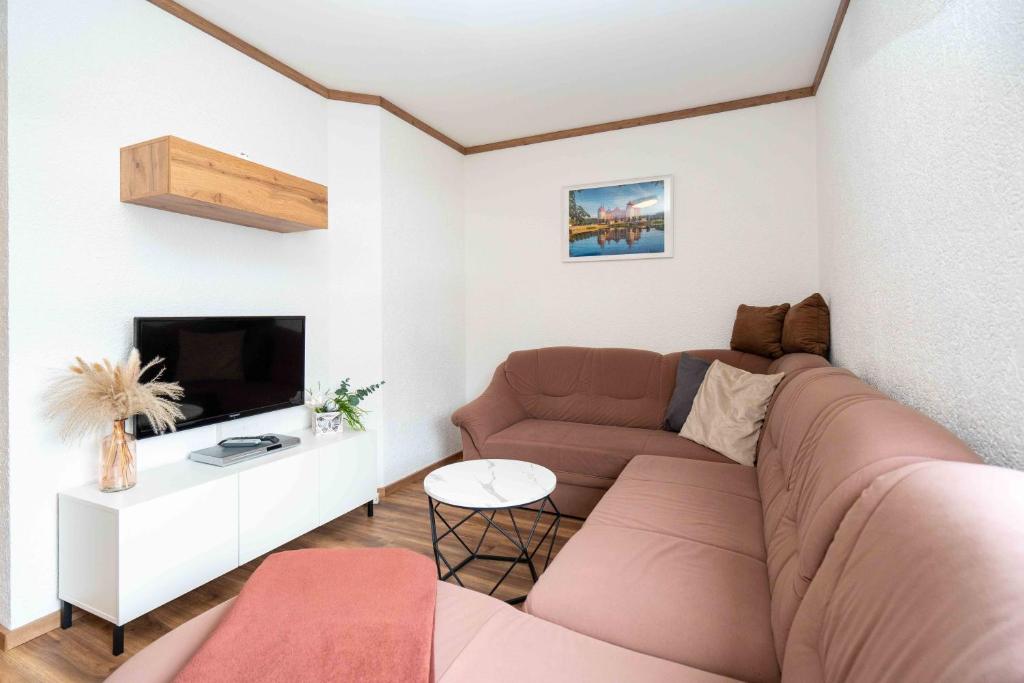 TV a/nebo společenská místnost v ubytování Ferienhaus Glöckner