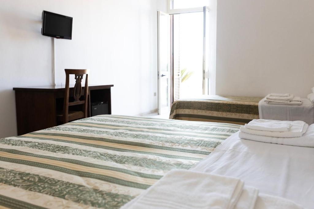 Postel nebo postele na pokoji v ubytování Masseria Fabrizio
