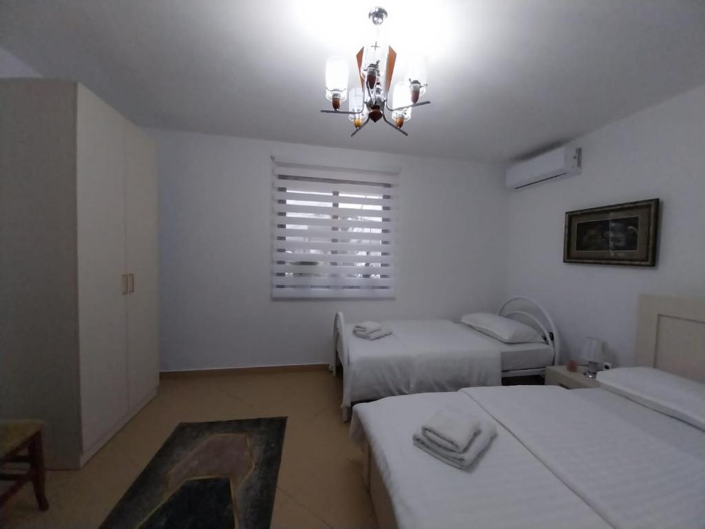 Katil atau katil-katil dalam bilik di Dean Apartment